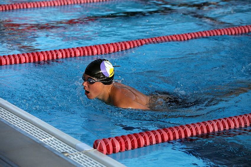 Keaton Clark, of Sarasota Military, swam for Booker High School Wednesday, Sept. 12.