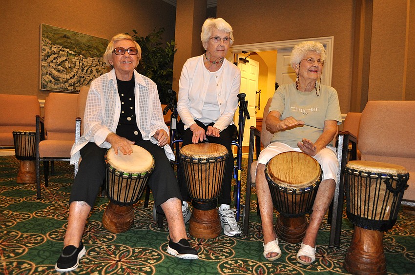 Jeanne Betty Weiner, Kay Sellors and Betty Fee have fun keeping the beat Monday, Sept. 24 during the drum circle at Sarasota Bay Club.