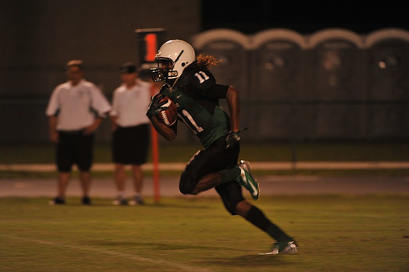 Lakewood Ranch freshman Brandon Luckett returns a punt for the Mustangs.