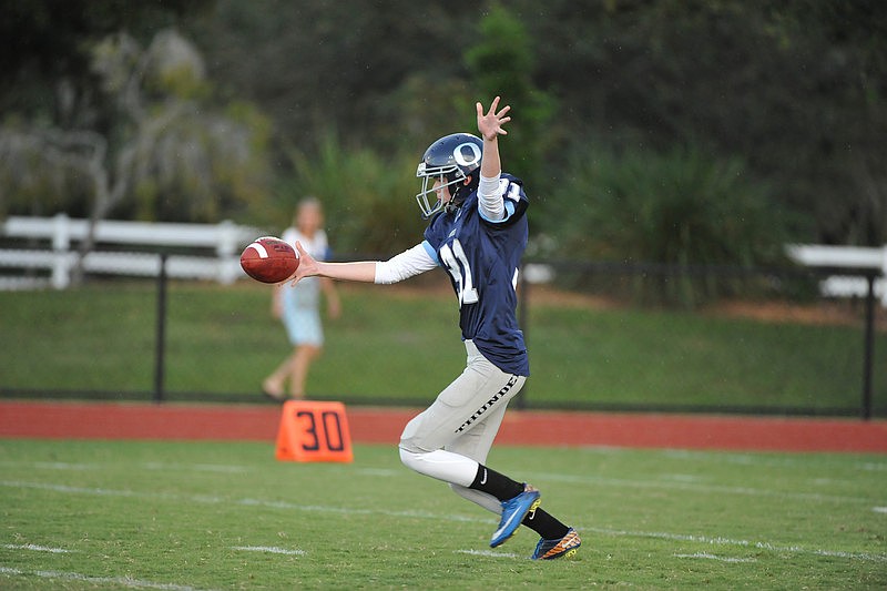 Junior Brian Kirshe punts the ball for ODA in the first half.