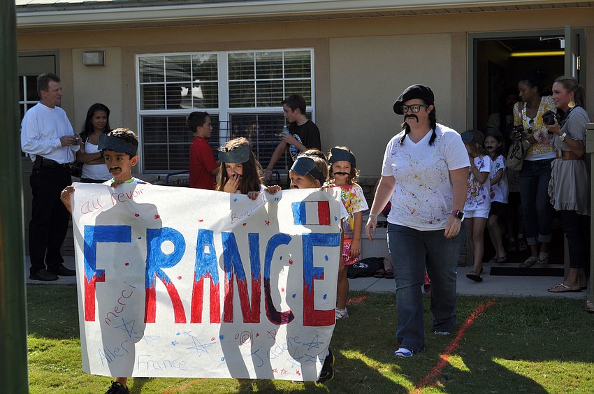 Students march in celebration of French culture.
