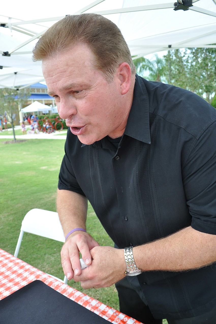 Mike Jones performed magic tricks for the crowd.