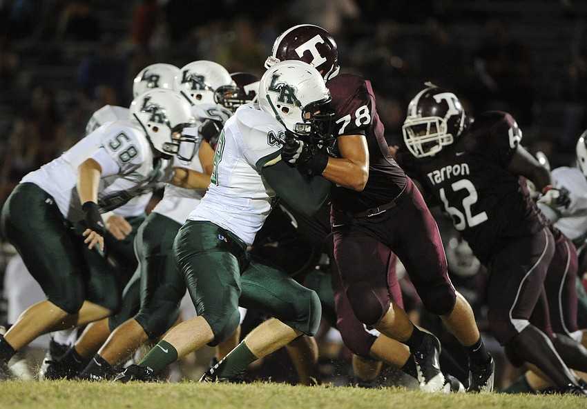 Lakewood Ranch junior defensive lineman Caleb Loppe attempts to get around a Tarpon Springs offensive lineman.