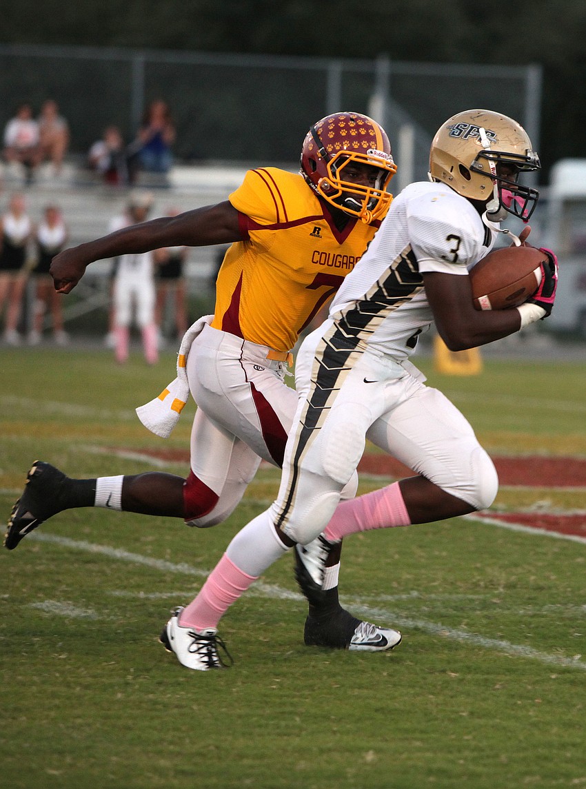 Demardre Patterson, No. 7, runs after Tony Jones, No. 3, Friday, Oct. 12.
