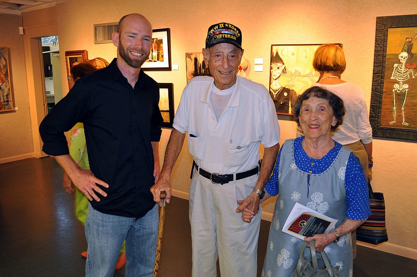 Artist Zach Gilliland with Bernard and Shirley Friedland