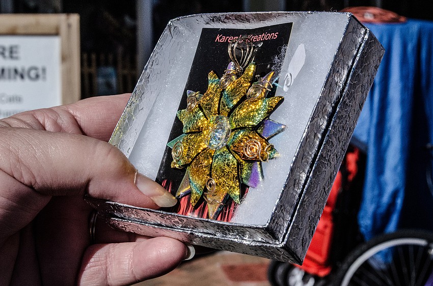 Karen and Jerry Hull cut dichroic glass to create shimmering jewelry. â€œIts very labor intensive, but its fun and itâ€™s beautiful, and every time I open the kiln I think its Christmas morning.â€