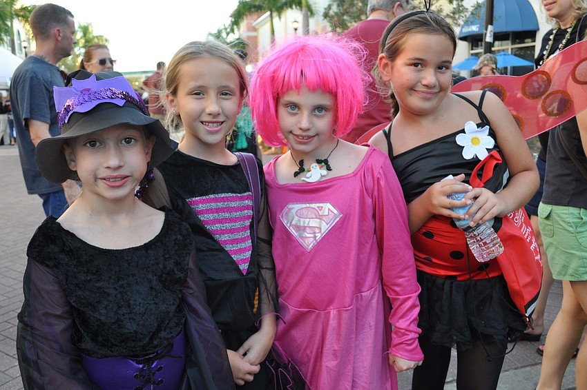 Megan Workman, Emma Cecil, Kimberley Barr and Madeline Fields are in Girl Scout Troop 764 together.
