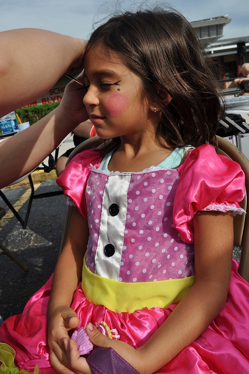 Cecilia Garcia made sure to have her face painted.