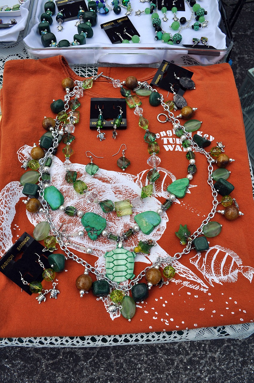 Necklaces and earrings made by Touch of Turquoise jewelry all with turtle themes were sold at the Longboat Key Turtle Watch Table Sunday, Oct. 28, during the Fall Festival at the Centre Shops. 20% of the proceeds went to Longboat Key Turtle Watch.