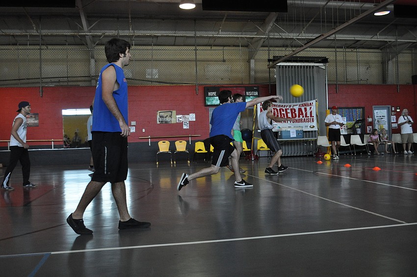 Players throw foam balls as they approach the throw line.