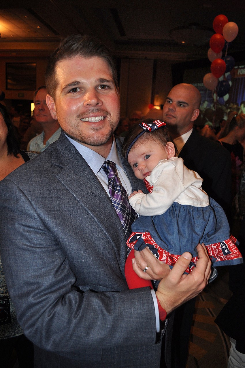 Nick Buchanan with Vern Buchananâ€™s grand-niece, Adriana, 9-weeks-old