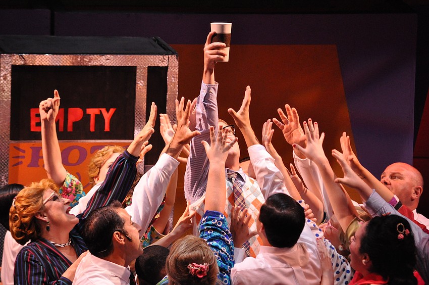 The cast desperately reaches for the last cup of coffee in the office