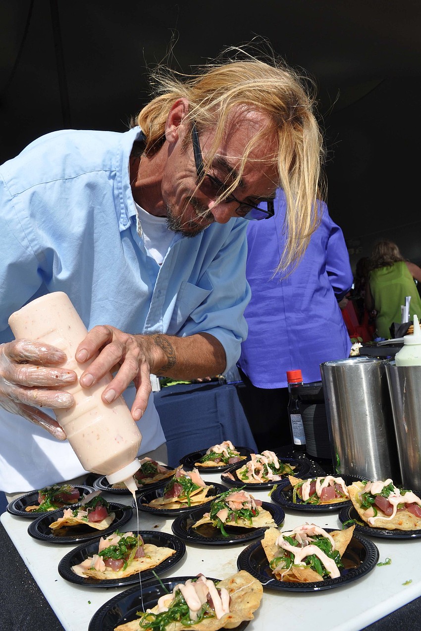 Jeff Cavanaugh, of the Beachhouse Restaurant, prepared tuna nachos for guests.