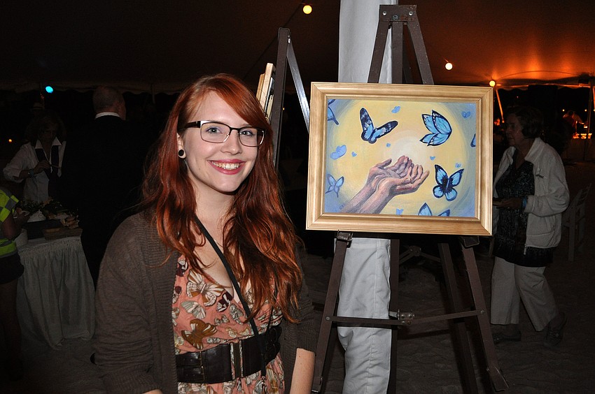 Grace Elizabeth poses with one of her pieces.