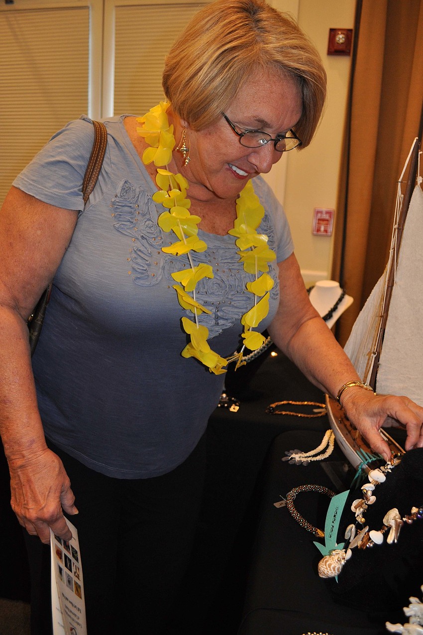 Jeanne Diedrick looked at some jewelry.