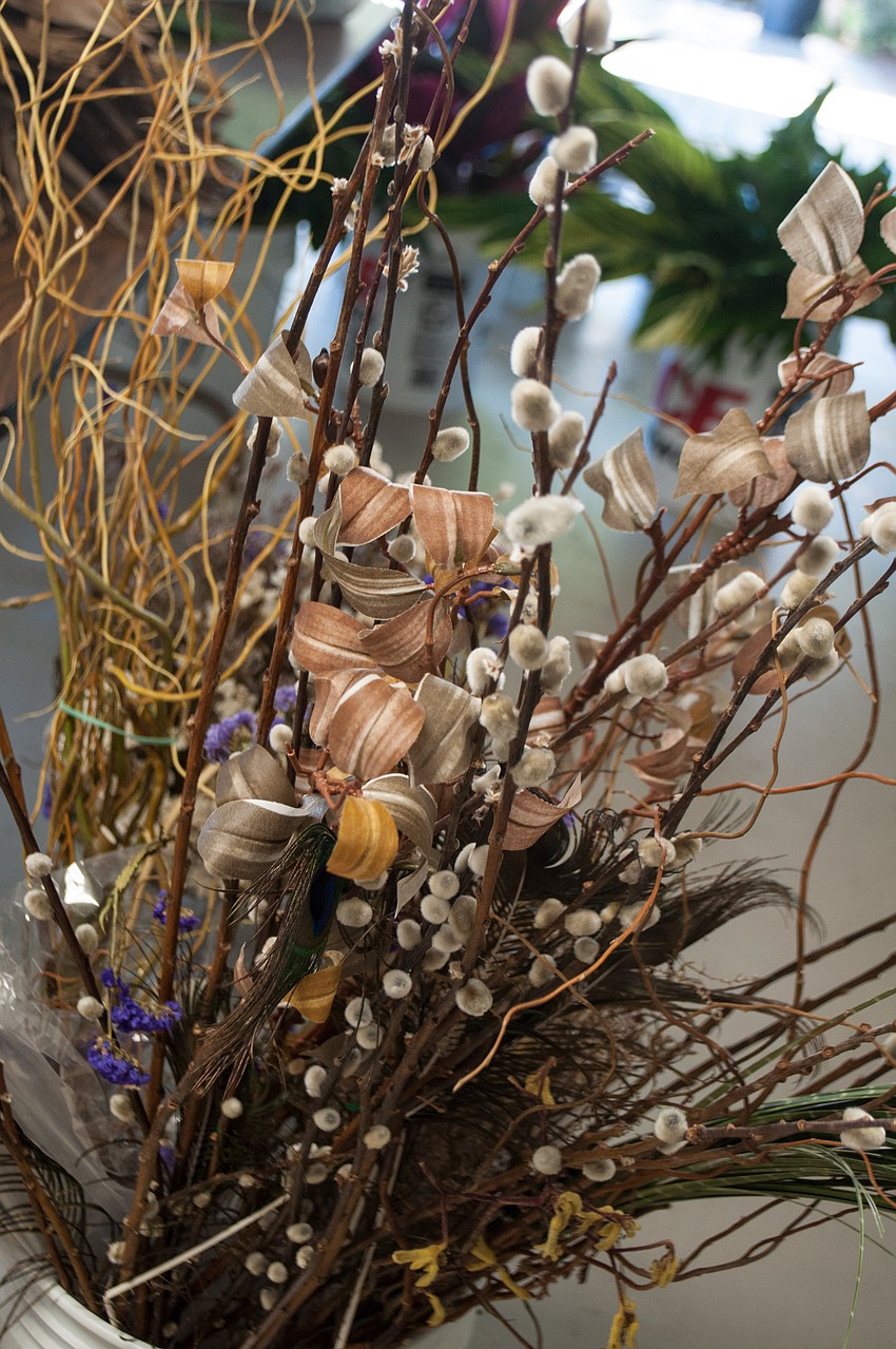 Members used all sorts of flowers and materials for the arrangements.