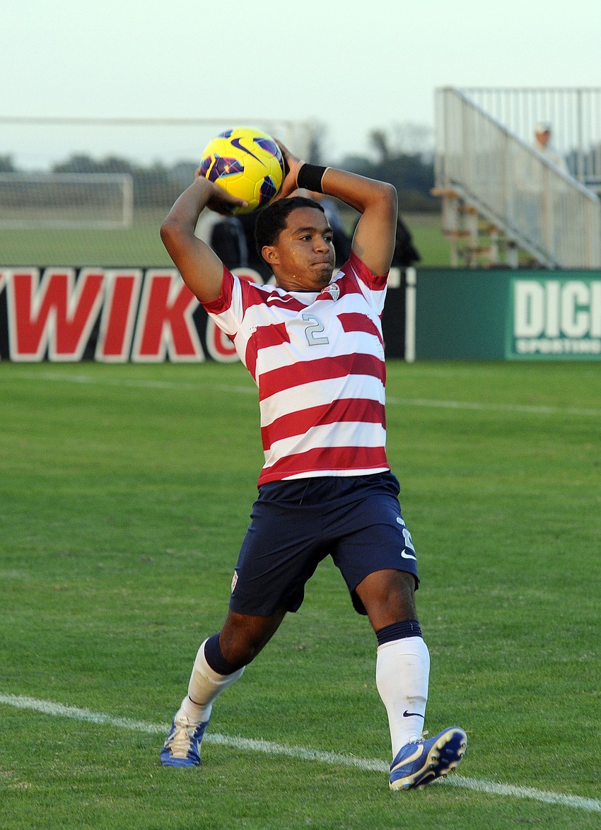 U.S. defender Elijah Martin throws the ball back into play during the first half.