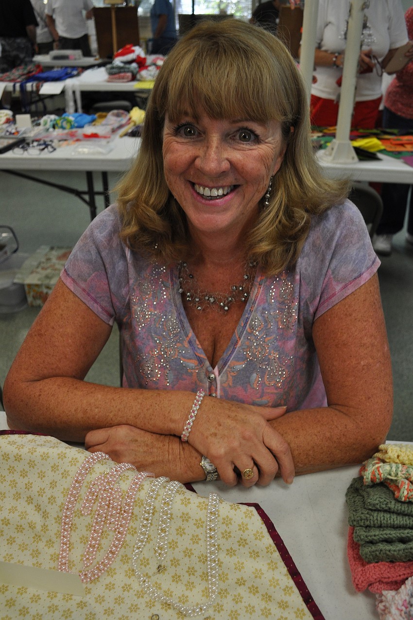 Bernice Wall sold bracelets, dishcloths and scarves.