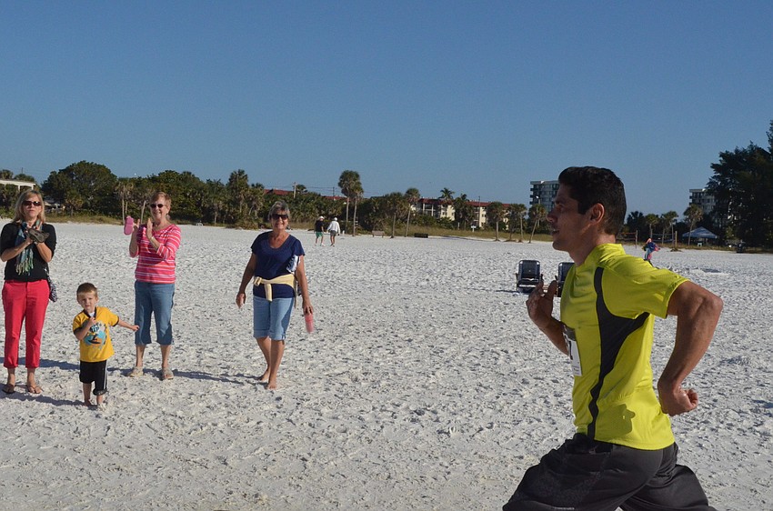 Benjamin Santiago came in second place with a time of 20:41.