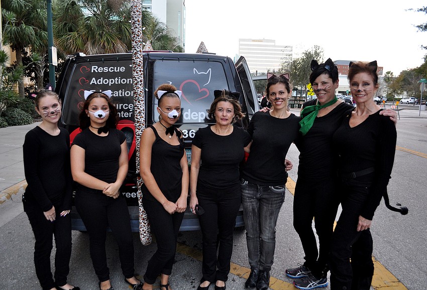 Cat Depot parade volunteers dressed as cats.