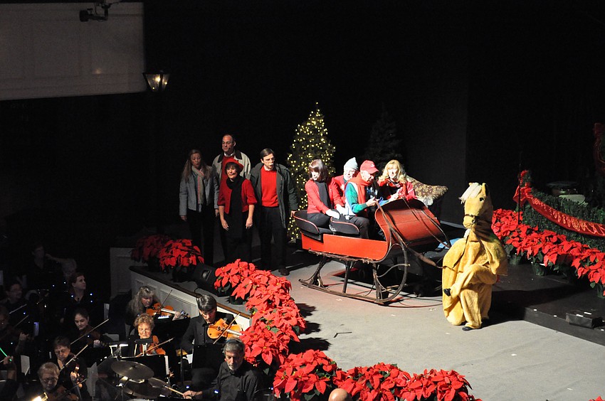 Actors from the First Sarasota Baptist Church kick off the 39th annual singing Christmas tree production.