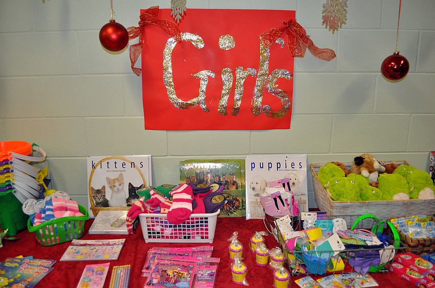 There were signs up to direct the students to where to go to find gifts for boys, girls, moms, dads, pets and more inside the Holiday House at Southside Elementary.