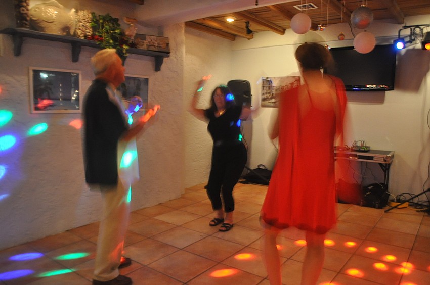Al Luke, Shirley Myers and Cheryl Trateau enjoy a spin on the dance floor.