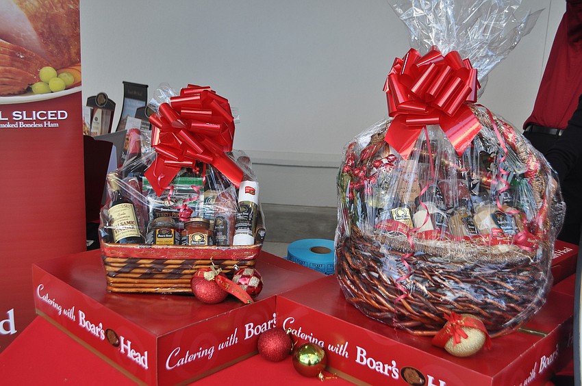Customers entered a raffle for Boars Head gift baskets outside of the store.