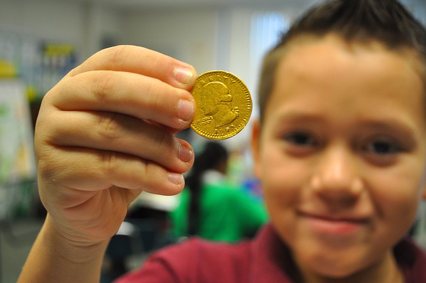 Maximo Garcia shows off his gelt.