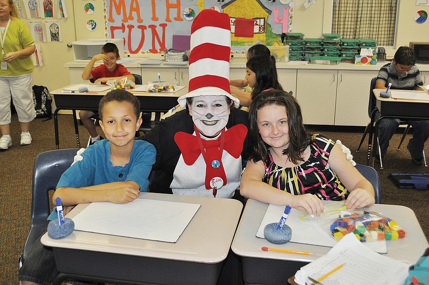 Sean Kolar, Laurie Butler and Joelle Kirkpatrick celebrated Dr. Seussâ€™ birthday at Fruitville Elementary.