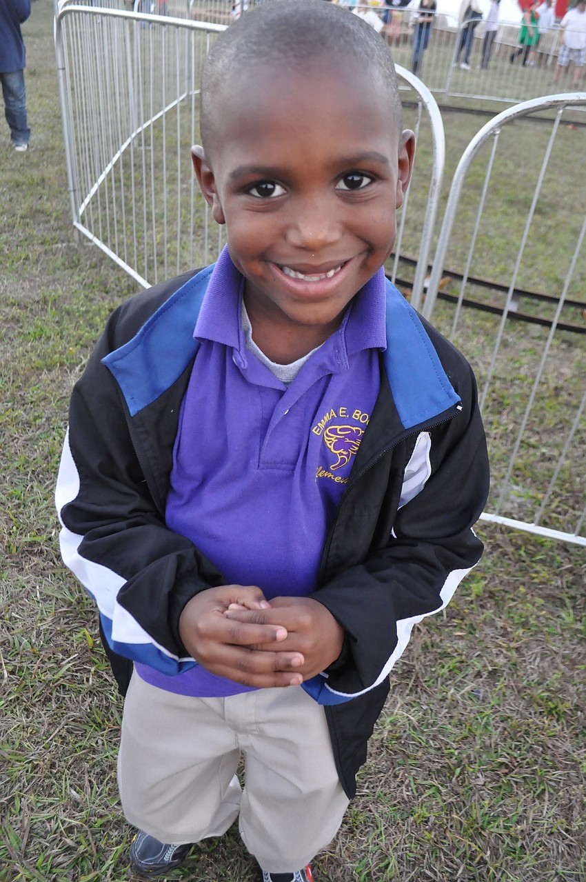 Dre Upshaw, 7, played games with his little brother London, 3, at Snow Fest Sarasota.