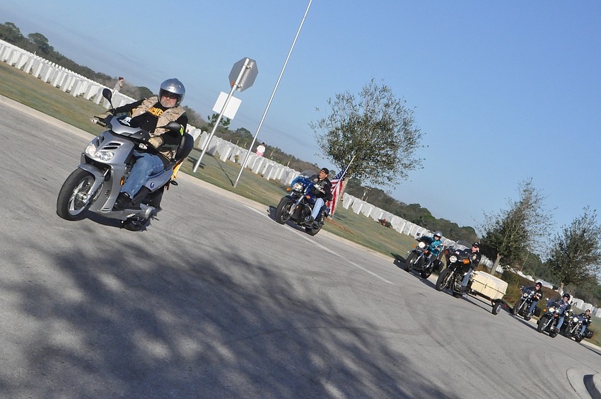 Close to 60 Patriot Guard bikes escorted the semi truck with wreaths into the cemetery.