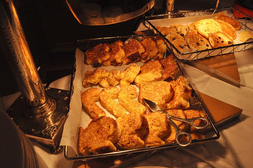 The French toast was cut into a variety of holiday shapes including mittens, candy canes, snowflakes and gingerbread men.