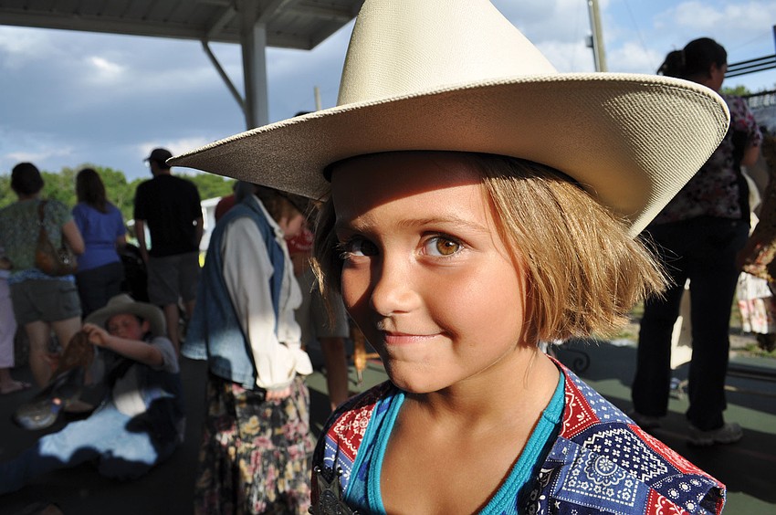 Ava Gracia, 6, enjoyed dressing in cowgirl attire, during Bashaw Elementary's Art and Music Festival May 11. Published May 17, 2012.