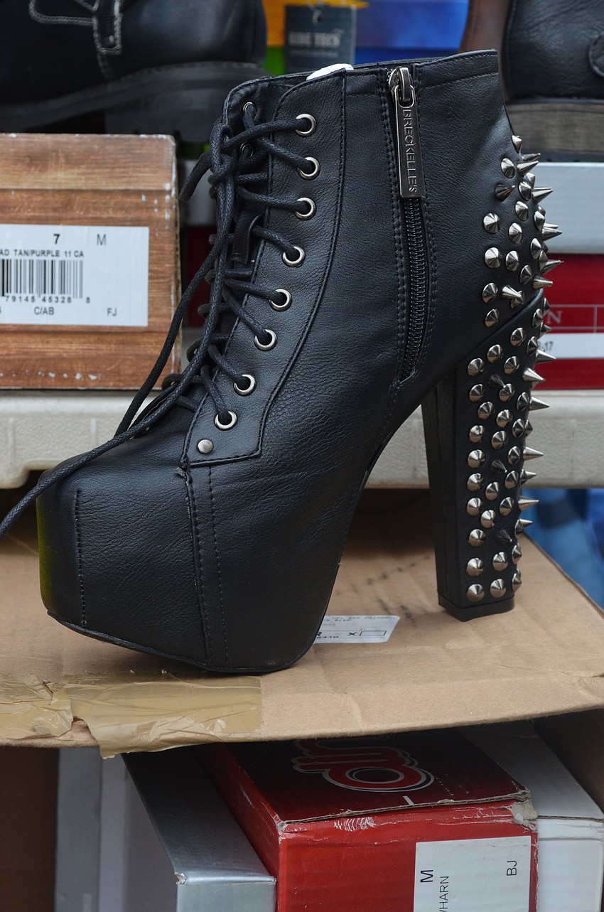 Many vendors sold leather goods like these spiky shoes.