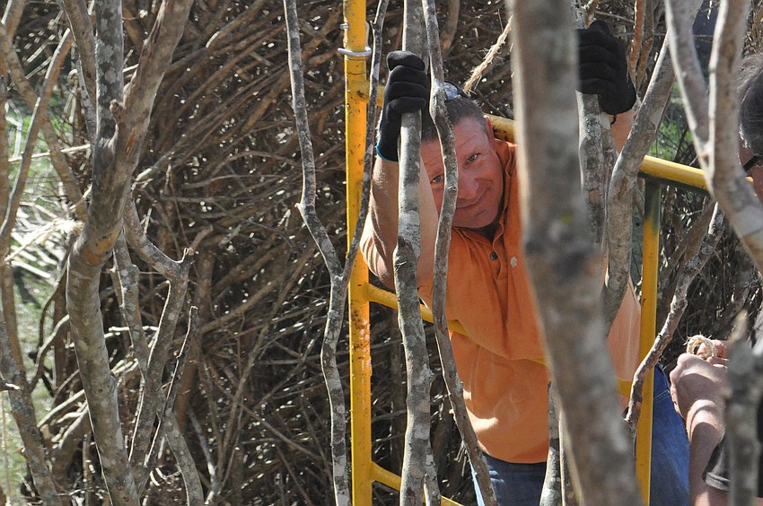 Maciej Sobolewski takes a day away from the office to help volunteer