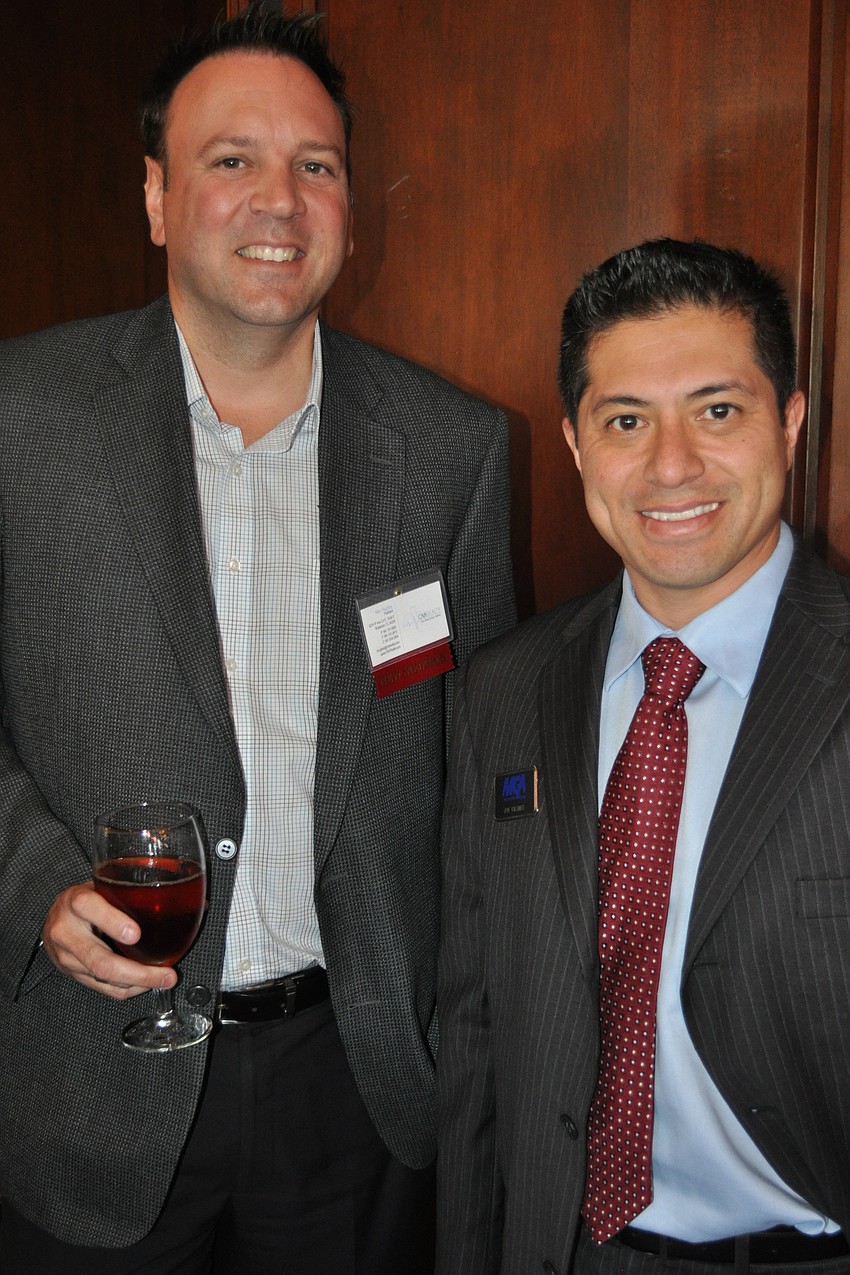 Ken Hughes, president of CNK Realty and a new member of the Lakewood Ranch Business Alliance, with Jon Talamas of MGA Insurance