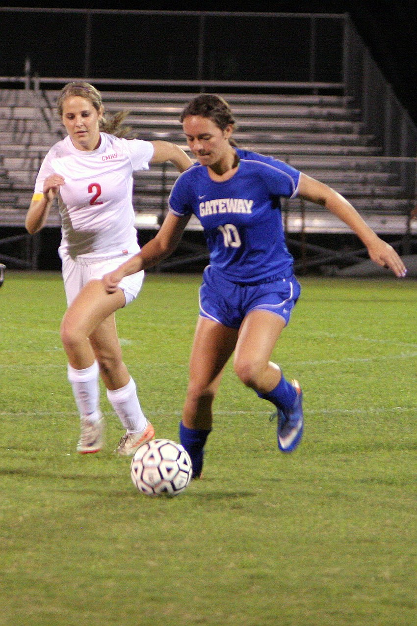 Cardinal Mooneyâ€™s Abby Goecker, No. 2, tries to catch up with Gatewayâ€™s Braeleen Scott, No. 10.