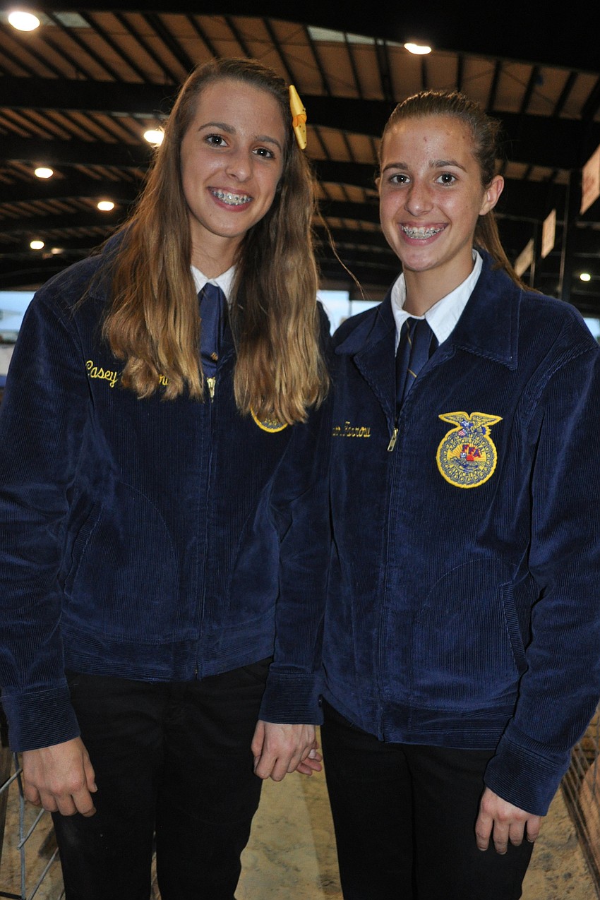 Sisters Casey and Brooke Farrow each showed a pig.