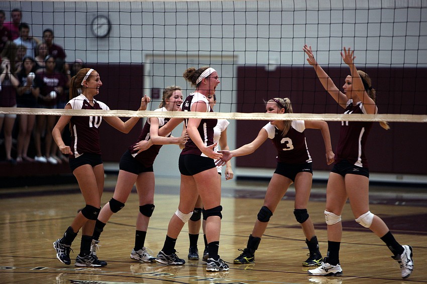 The Lady Rams celebrate a big point during one of their three games against the Sarasota Sailors Monday, Sept. 17 at Riverview High Schoolâ€™s Gymnasium.