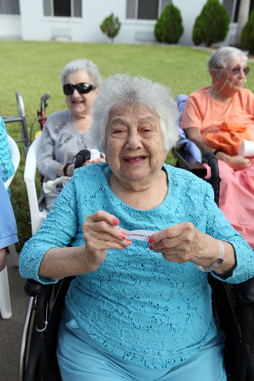 Flora Fox holds up some of her sins.