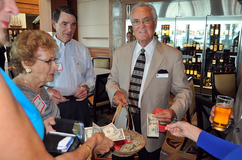 Jack Black sells 50/50 raffle tickets Wednesday, Sept. 19 at Longboat Key Republican Clubâ€™s meeting at the Sarasota Yacht Club.
