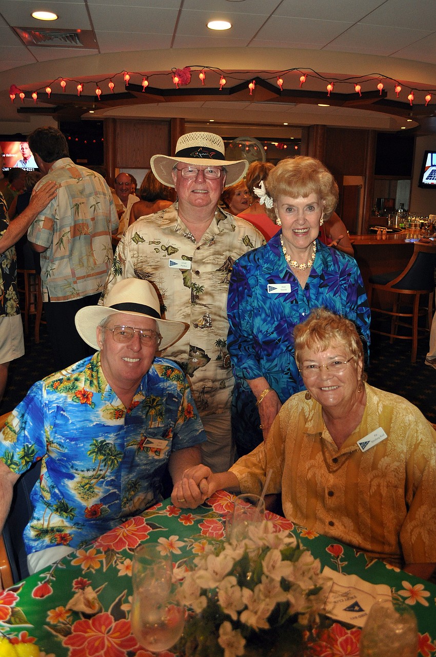 Cliff Parker and Ann Smith pose behind Sam Keal and Pat Ihlenburg-Keal