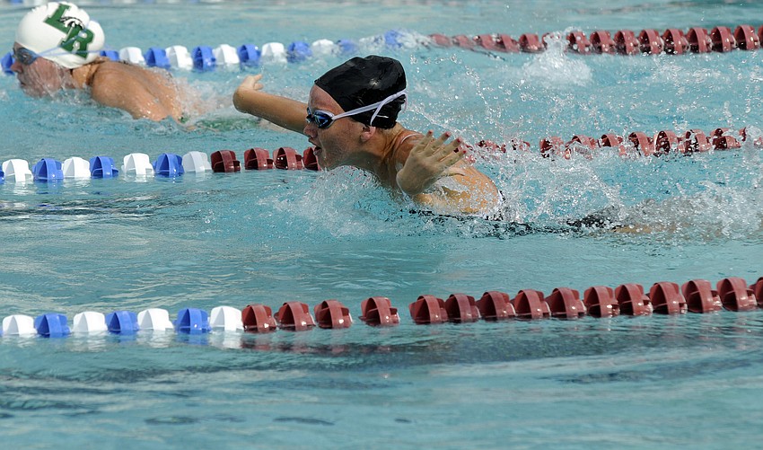 Braden Riverâ€™s Molly Lightner attempts to chase down Lakewood Ranchâ€™s Morgan Scott in the 100-yard butterfly.