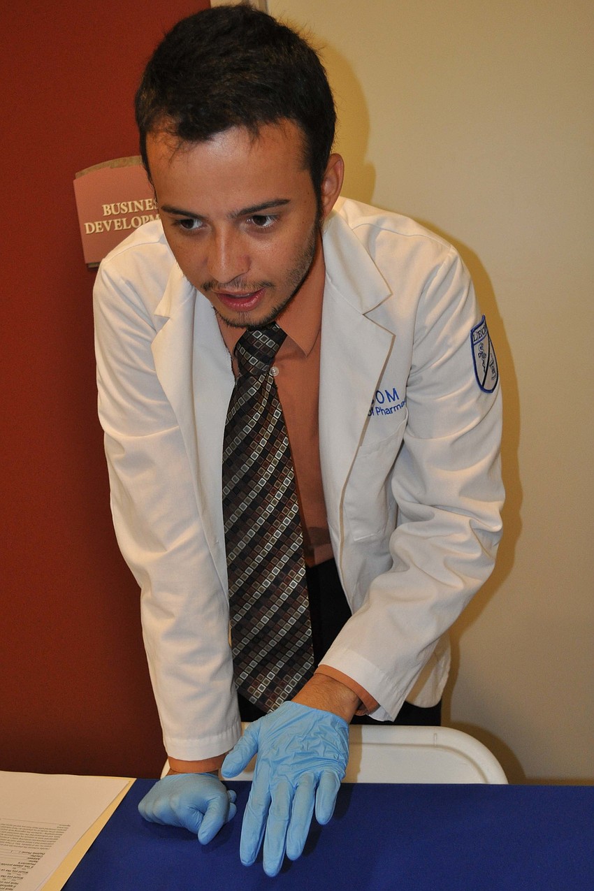 Lake Erie College of Osteopathic Medicine Pharmacy School student Jack Kain conducted glucose screenings.