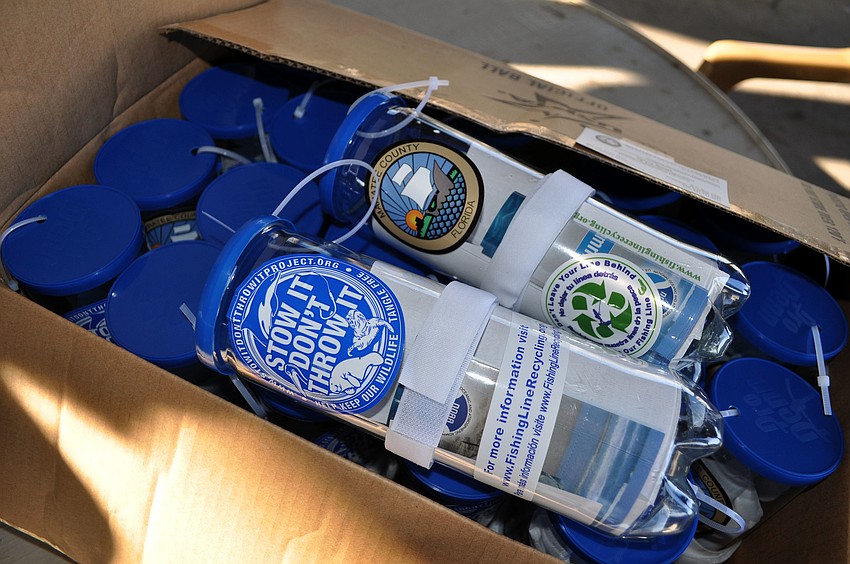Manatee County donated plastic tennis ball bottles with info about monofilament cleaning and a place to store fishing line.