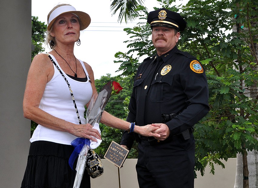â€œI hope you come by and have good memories of a great man,â€ said Leslie Hogle Wednesday, Oct. 3 during the tree dedication ceremony for her late husband, Al Hogle, at the Longboat Key Police Station.