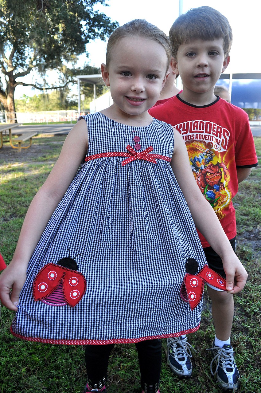 Neveah Antini-Moore, 5, shows off her ladybug dress.