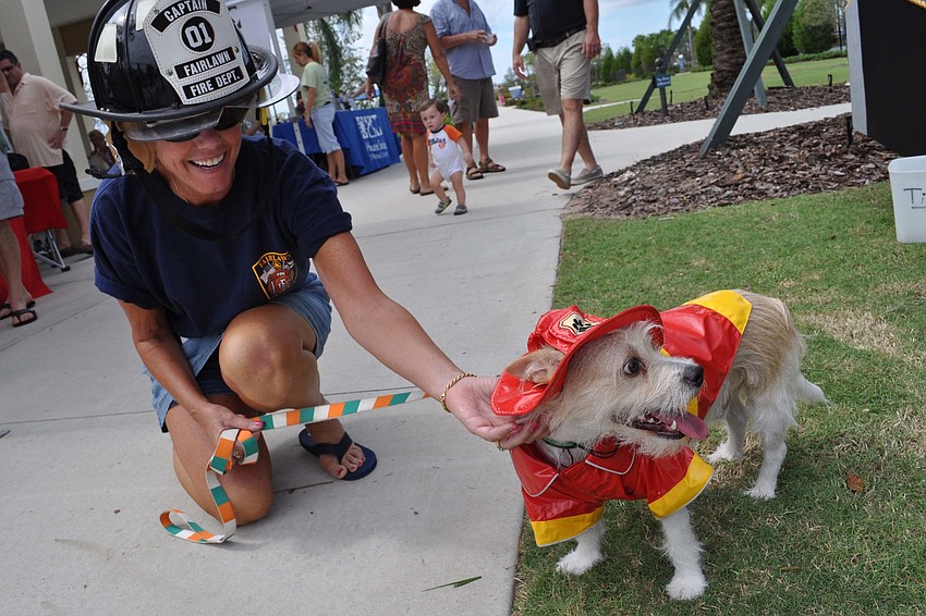 Joyce North and her dog, Rooney, competed in the â€œMario and Luigiâ€ dog costume contest.