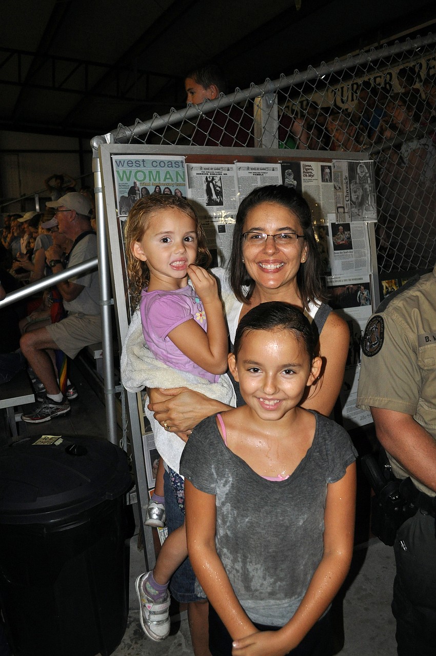 Luci Beth Hamm stands with her daughters, Jayme and Bailey